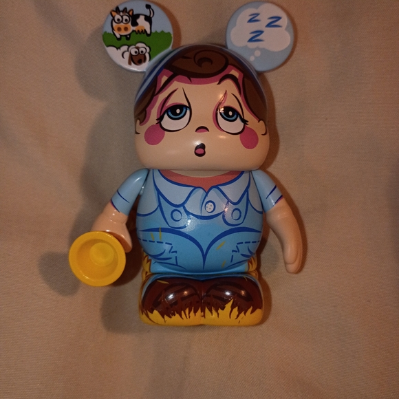 Blue and Yellow Farmer Toy Figure - Picture 1 of 3